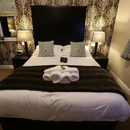 Konukevi Woodlands 4*